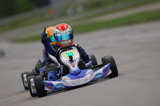 Lachlan DeFrancesco celebrates his victory at the New Castle Motorsports Park (Photo by: OTP.ca)